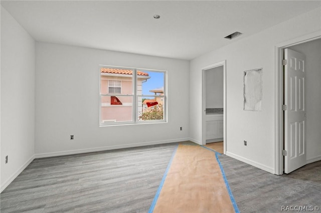 empty room featuring light hardwood / wood-style floors