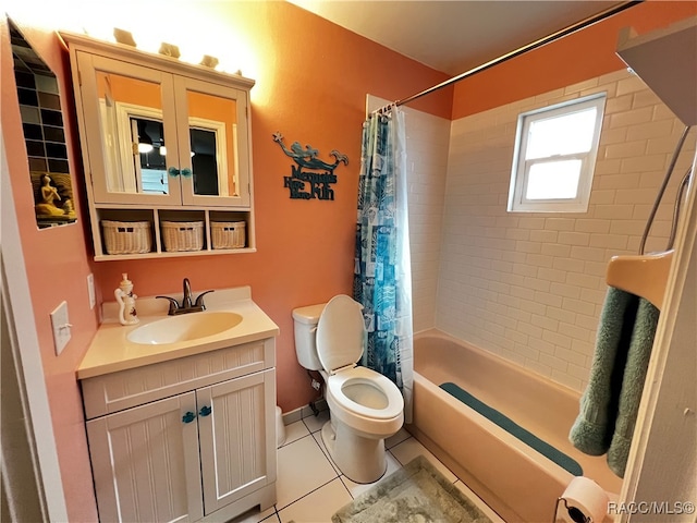 full bathroom featuring tile patterned flooring, vanity, toilet, and shower / bathtub combination with curtain