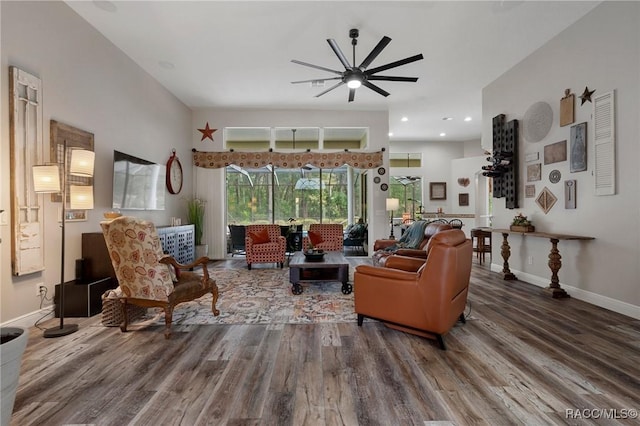 living room featuring recessed lighting, ceiling fan, baseboards, and wood finished floors