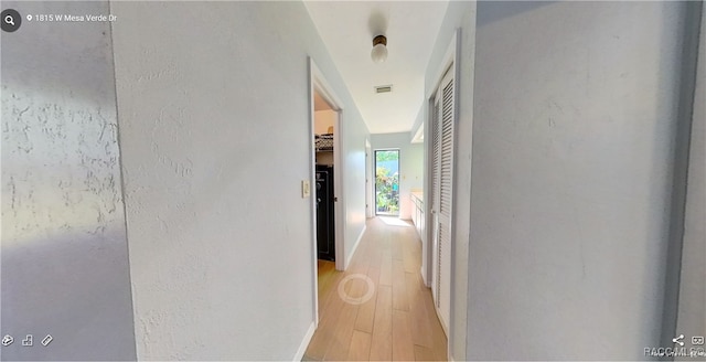 hallway featuring light hardwood / wood-style floors