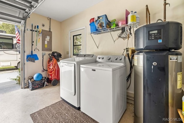 laundry area with a healthy amount of sunlight, electric panel, and washer and clothes dryer