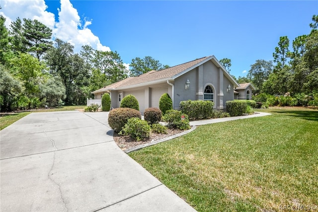 view of front of home featuring a front lawn