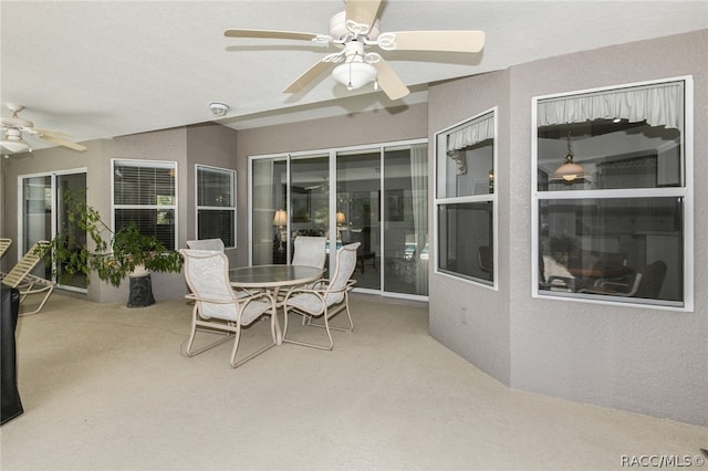 view of patio with ceiling fan