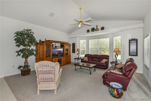 carpeted living room featuring ceiling fan and lofted ceiling