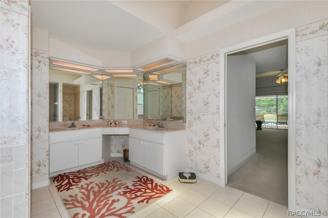 bathroom featuring tile patterned flooring and vanity