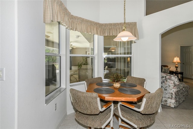 dining area featuring light tile patterned floors