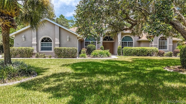 view of front of house with a front lawn