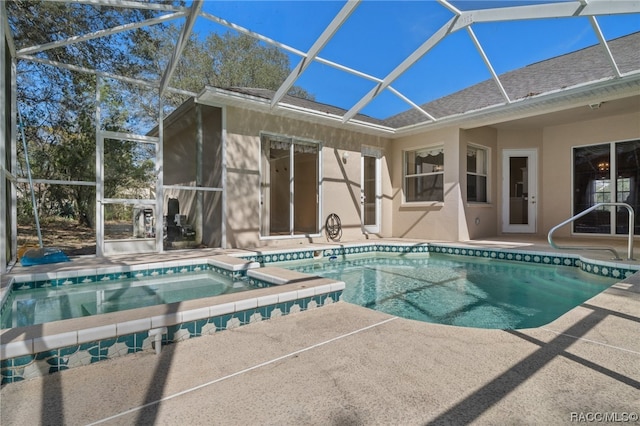 view of swimming pool featuring a patio and glass enclosure