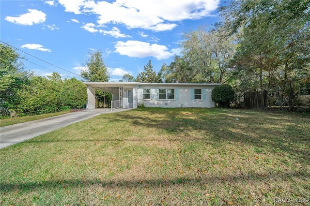 single story home featuring a carport, concrete driveway, and a front lawn