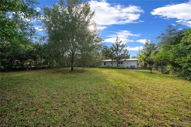 view of yard with fence