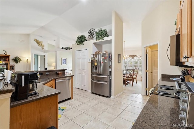 kitchen featuring light tile patterned flooring, stainless steel appliances, high vaulted ceiling, and dark stone counters