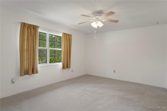 6580 E Glencoe St, Inverness, FL 34452 - empty room with light colored carpet, ceiling fan, and a textured ceiling