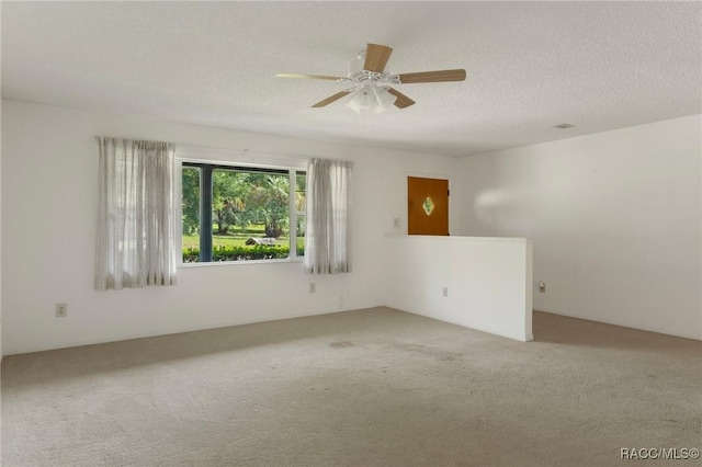 6580 E Glencoe St, Inverness, FL 34452 - carpeted empty room with ceiling fan and a textured ceiling