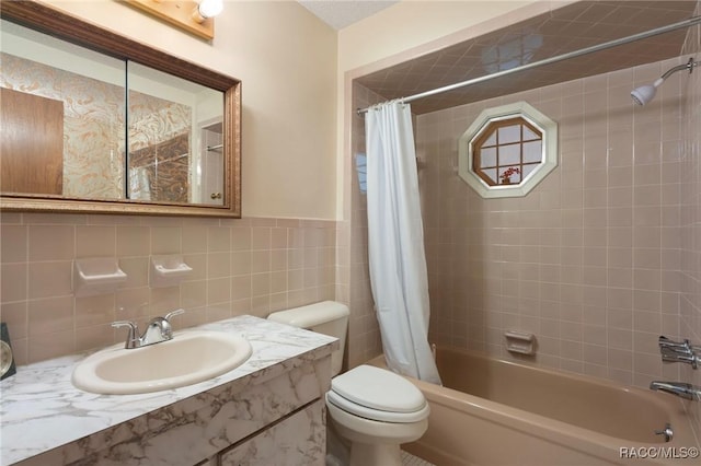 6580 E Glencoe St, Inverness, FL 34452 - bathroom with shower / tub combo with curtain, toilet, vanity, tile walls, and a wainscoted wall