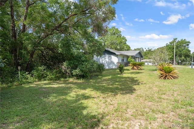 6580 E Glencoe St, Inverness, FL 34452 - view of green lawn