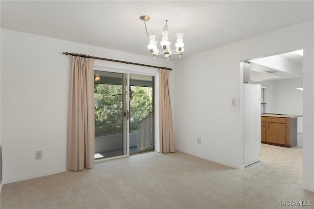 6580 E Glencoe St, Inverness, FL 34452 - spare room with a chandelier and light carpet