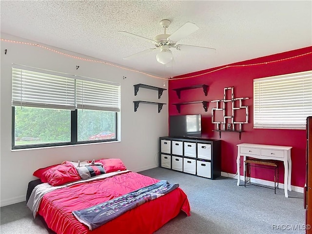 2582 W Fairway Loop, Citrus Springs, FL 34434 - bedroom featuring carpet floors, a textured ceiling, and ceiling fan