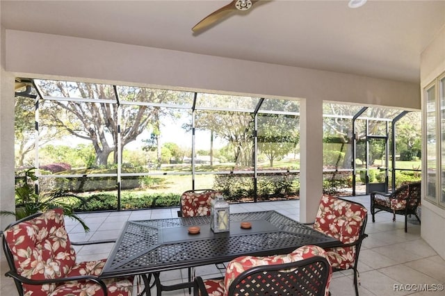 sunroom / solarium with ceiling fan