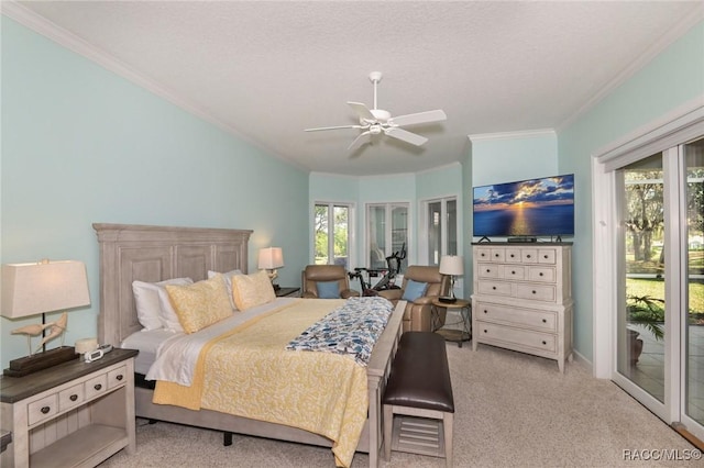 carpeted bedroom featuring crown molding, access to outside, a textured ceiling, and ceiling fan