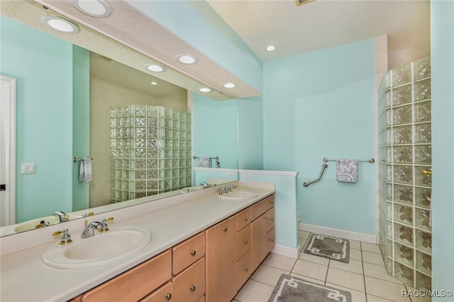 bathroom with tile patterned floors and vanity