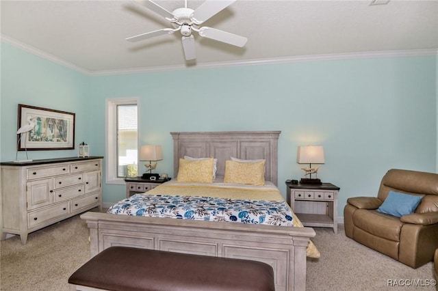 bedroom featuring crown molding, ceiling fan, and light carpet