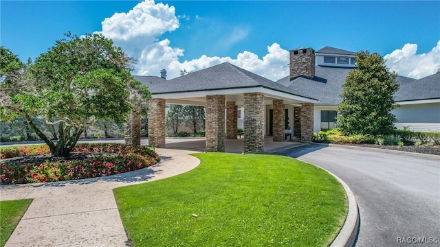 view of front of home with a front yard