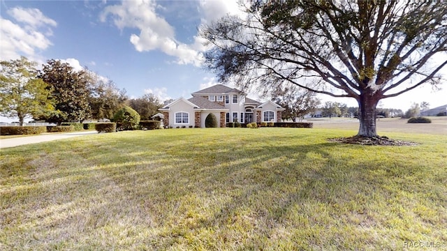 view of front of home with a front yard