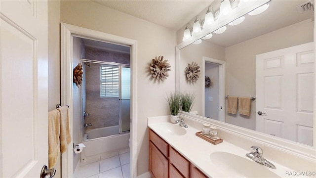 full bathroom with double vanity, a sink, visible vents, and tile patterned floors