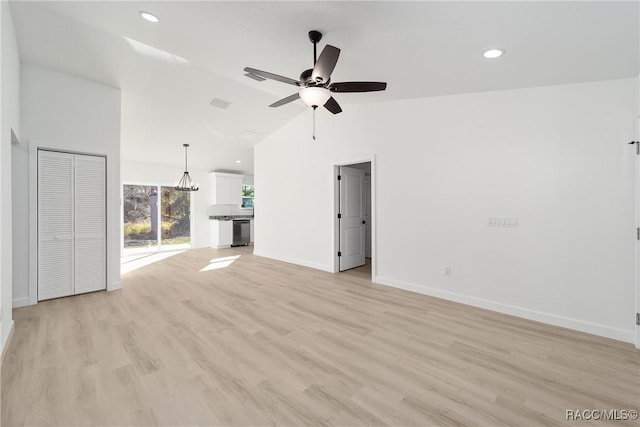 unfurnished living room with light wood finished floors, recessed lighting, ceiling fan, high vaulted ceiling, and baseboards