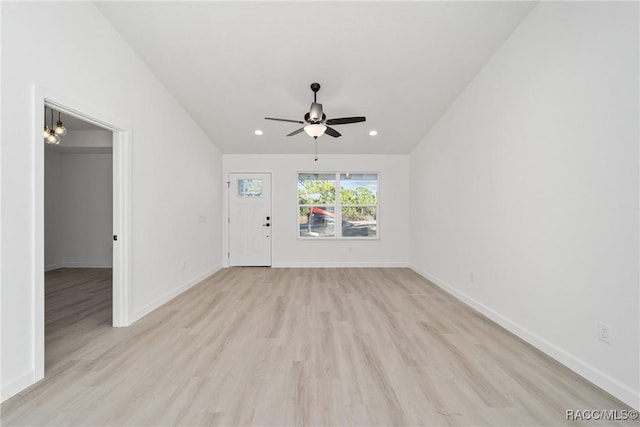 unfurnished living room featuring baseboards, ceiling fan, light wood finished floors, and recessed lighting