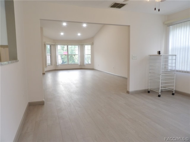 unfurnished room featuring light hardwood / wood-style flooring and ceiling fan