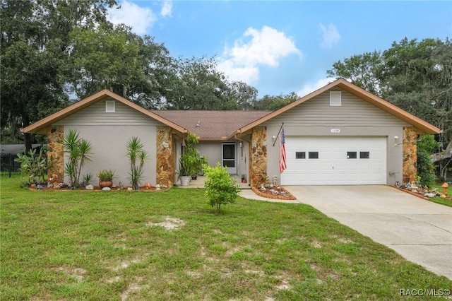 ranch-style home featuring a front yard and a garage