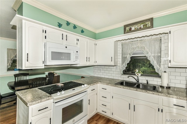 kitchen featuring white appliances, white cabinets, crown molding, sink, and dark hardwood / wood-style flooring