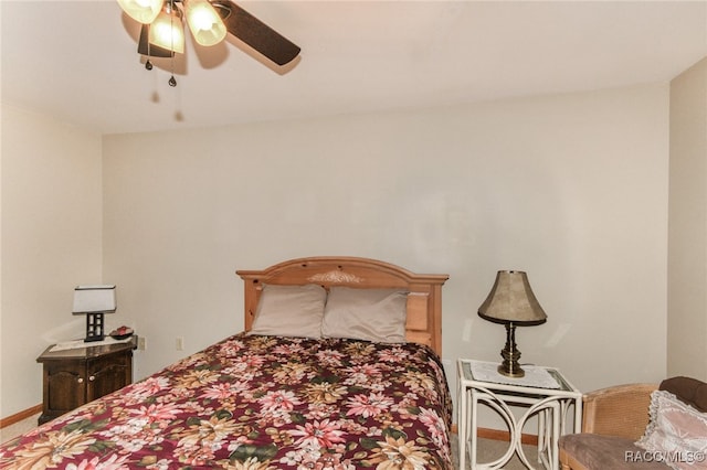 bedroom featuring ceiling fan and carpet floors