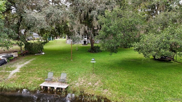 view of yard with a water view