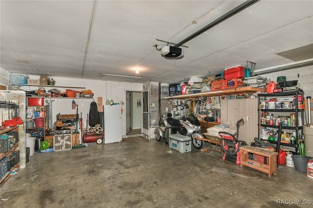 garage featuring a garage door opener