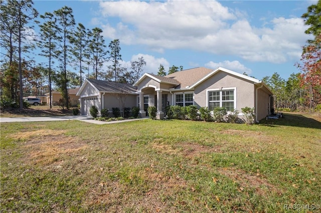 ranch-style house with a garage and a front yard