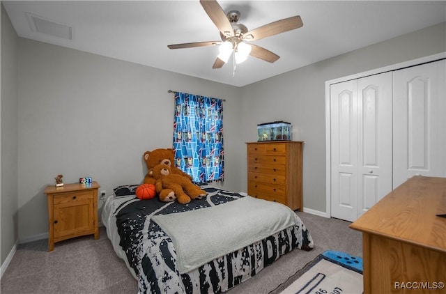 bedroom with carpet floors, ceiling fan, and a closet