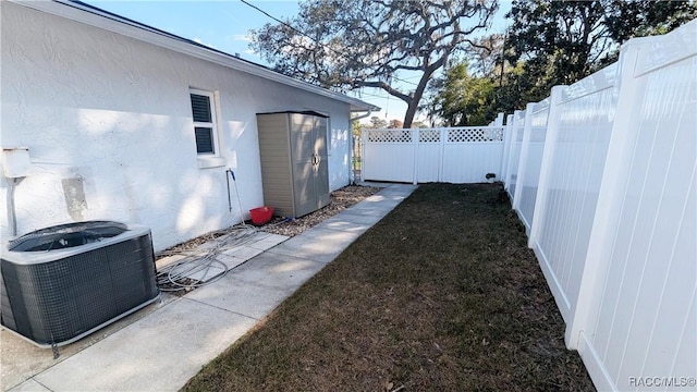 view of yard featuring central AC unit