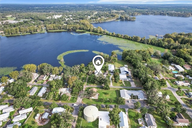 birds eye view of property featuring a water view