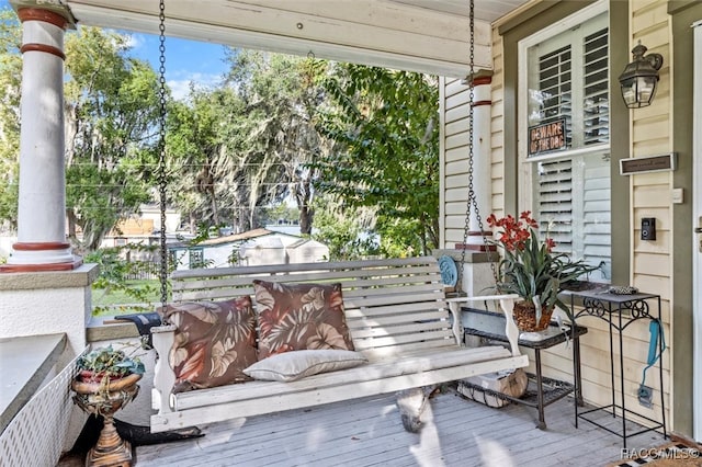 balcony featuring covered porch