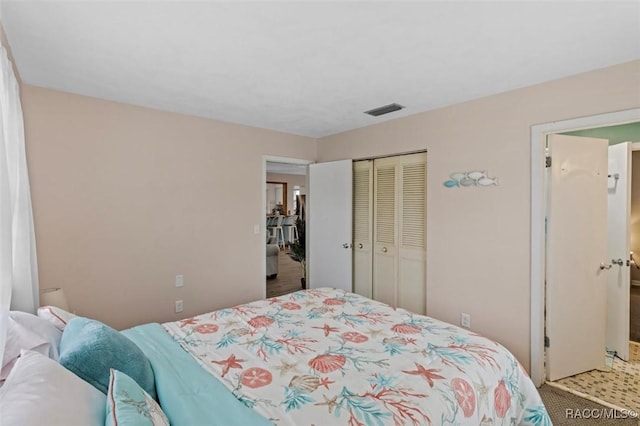 9125 N Abbot Dr, Citrus Springs, FL 34434 - bedroom with a closet and carpet