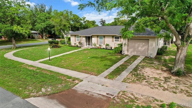 9125 N Abbot Dr, Citrus Springs, FL 34434 - ranch-style home with driveway, a garage, stucco siding, and a front lawn