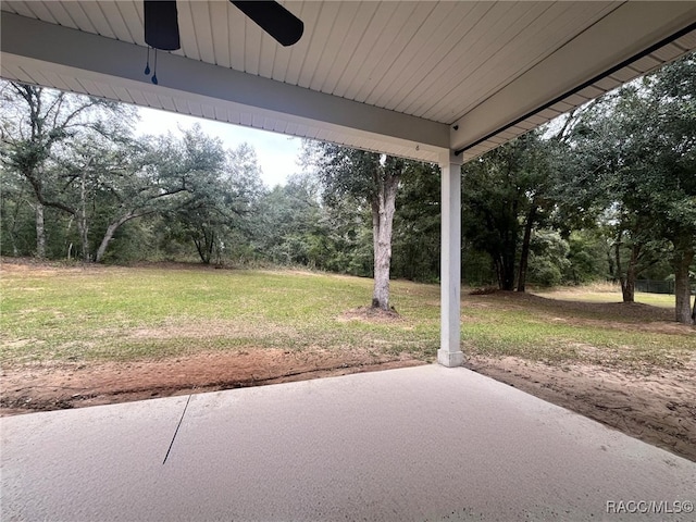 view of patio featuring ceiling fan