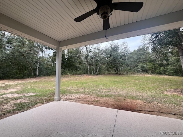 view of patio / terrace featuring ceiling fan