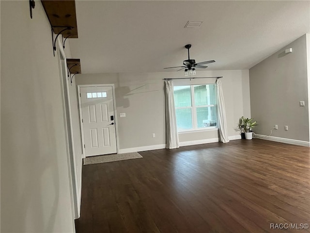 entryway with ceiling fan and dark hardwood / wood-style flooring