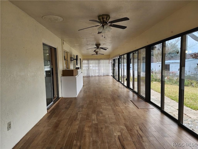 unfurnished sunroom with a healthy amount of sunlight