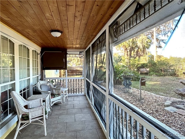 sunroom with wood ceiling