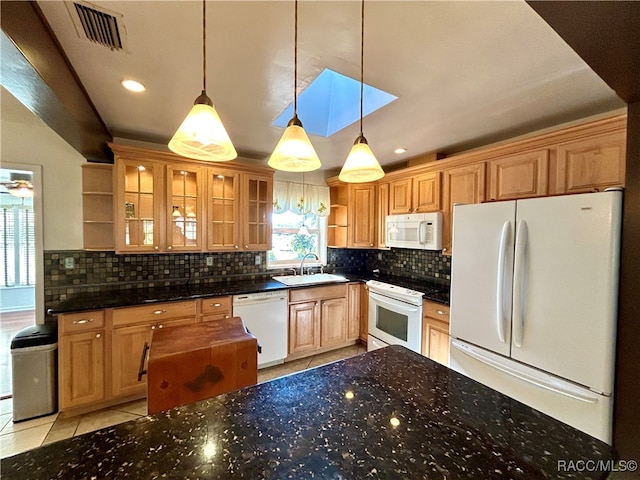 kitchen with sink, hanging light fixtures, backsplash, white appliances, and light tile patterned flooring