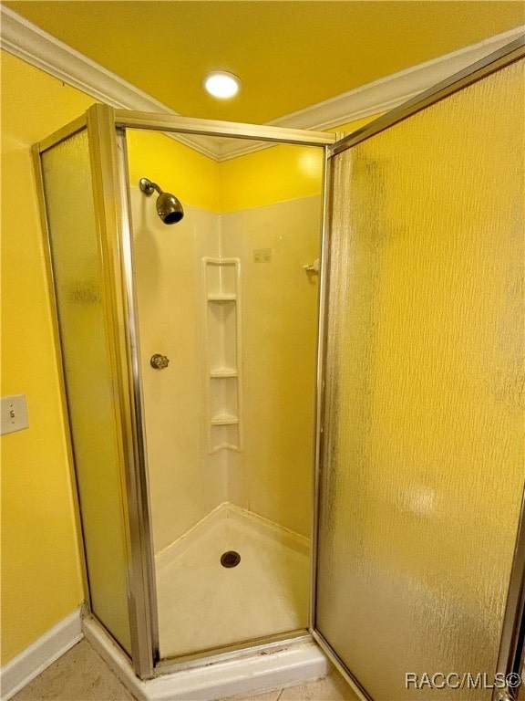 bathroom featuring an enclosed shower